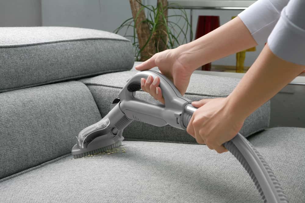sofa cleaning with Vacuum cleaner