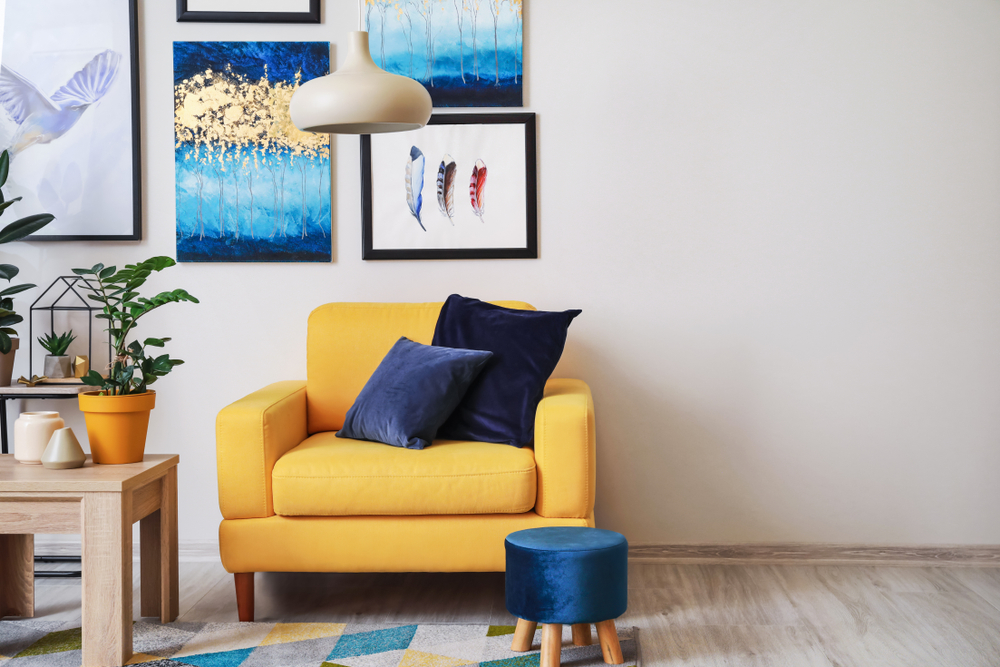 Classic blue cushions with Yellow sofa