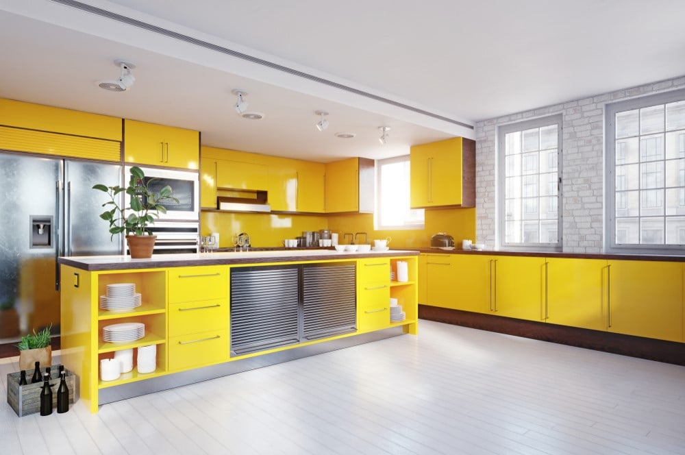 yellow kitchen with steel cabinets
