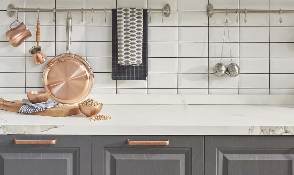 vinyl tiles Accent wall with Copper pots and pans