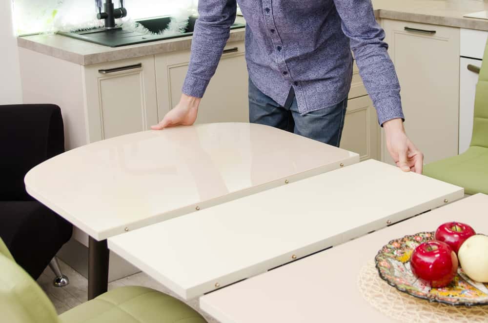 keep space saving furniture like foldable dining table 