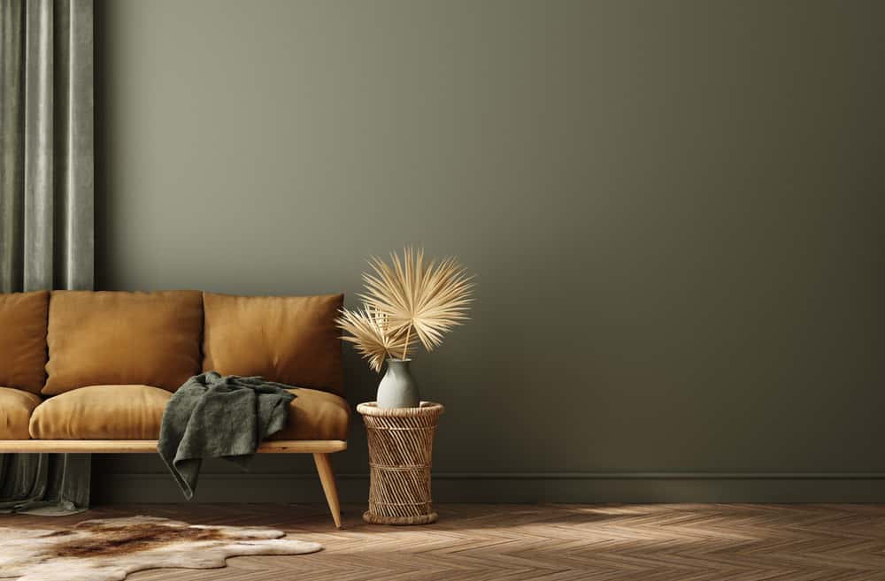 Olive green wall and brown sofa upholstery