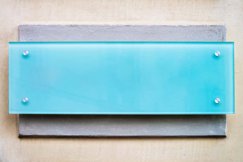 blue & gray concrete glass name plate