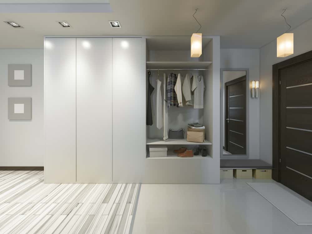 ceiling-to-floor white wardrobe
