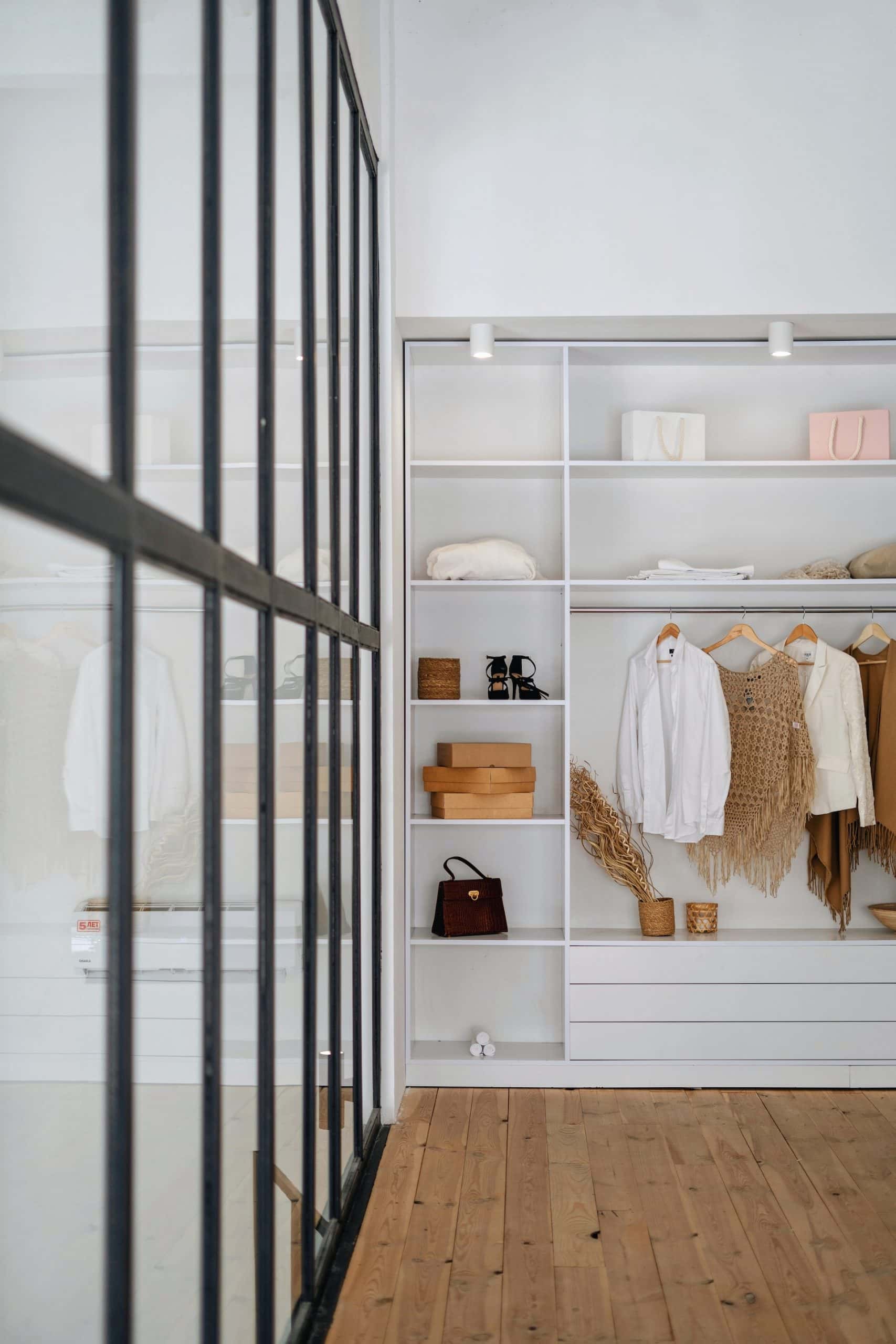 shelves in a walk-in white wardrobe