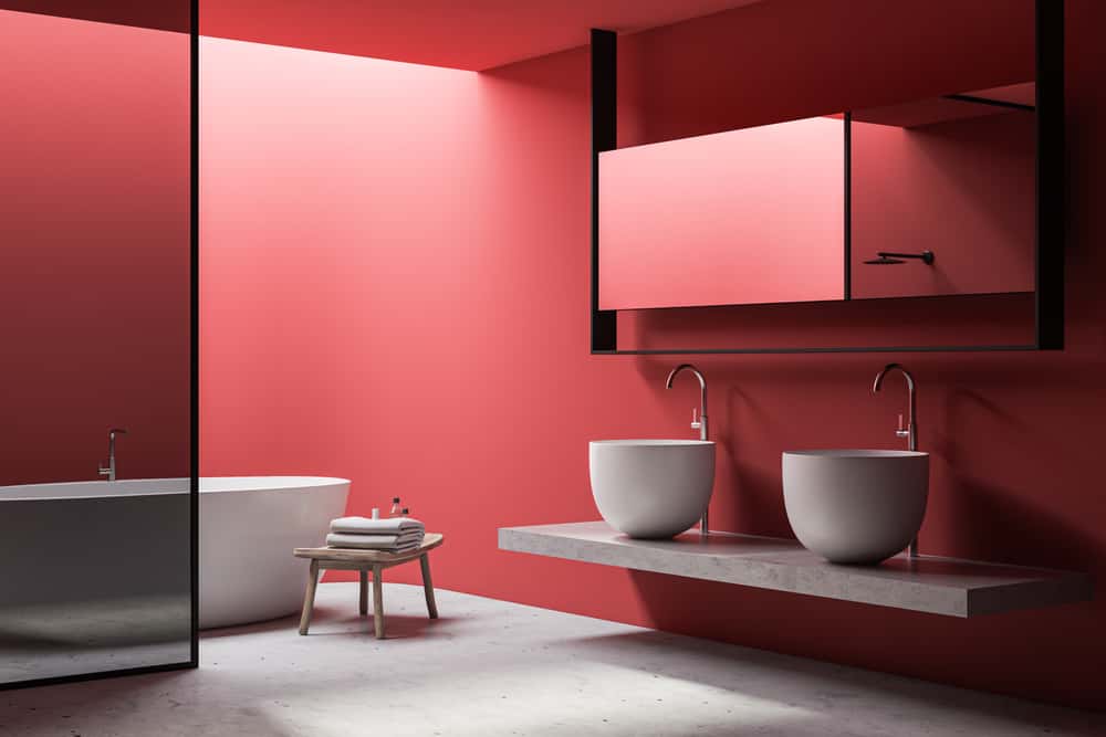 bathroom pop design with red accents