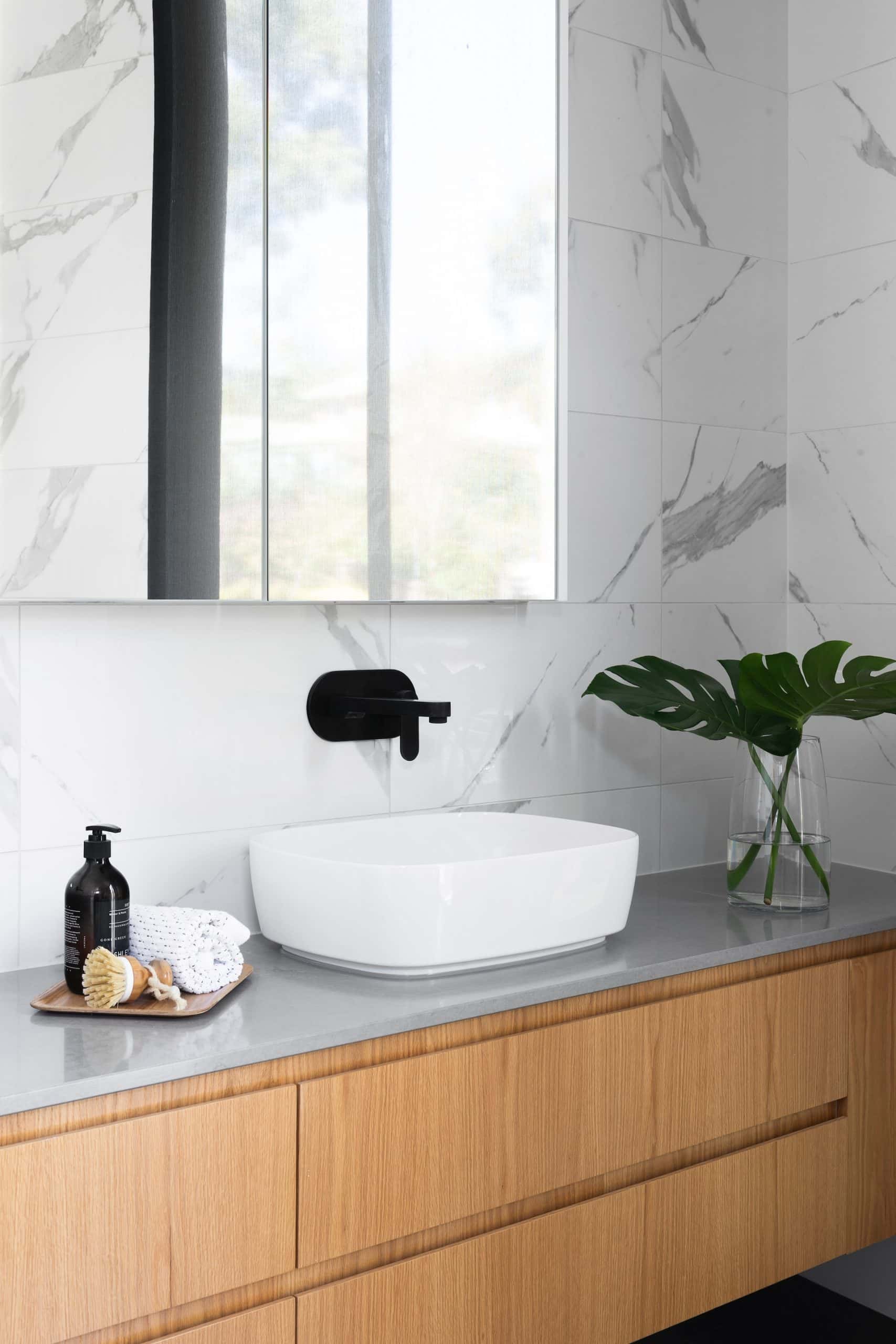 black wall-mounted wash basin tap design