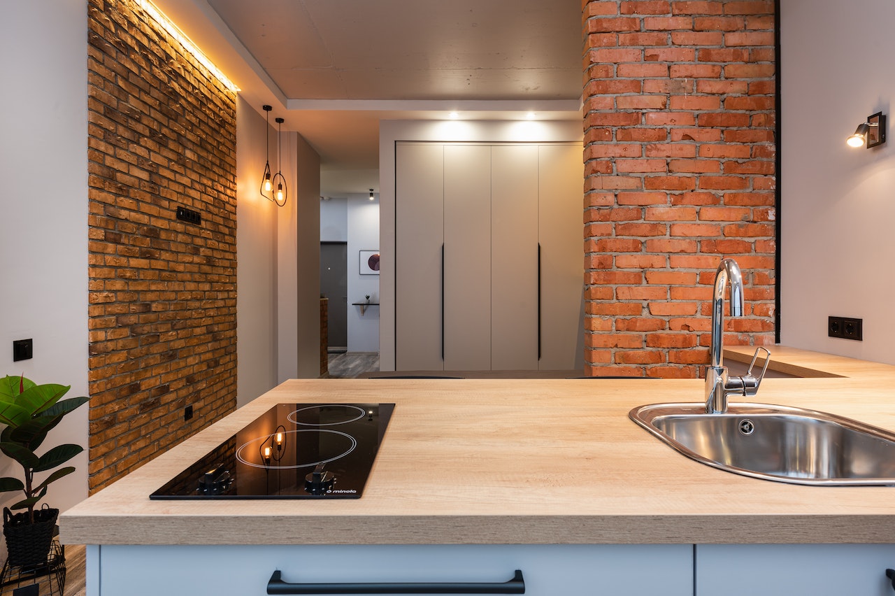 brick wall kitchen entrance design