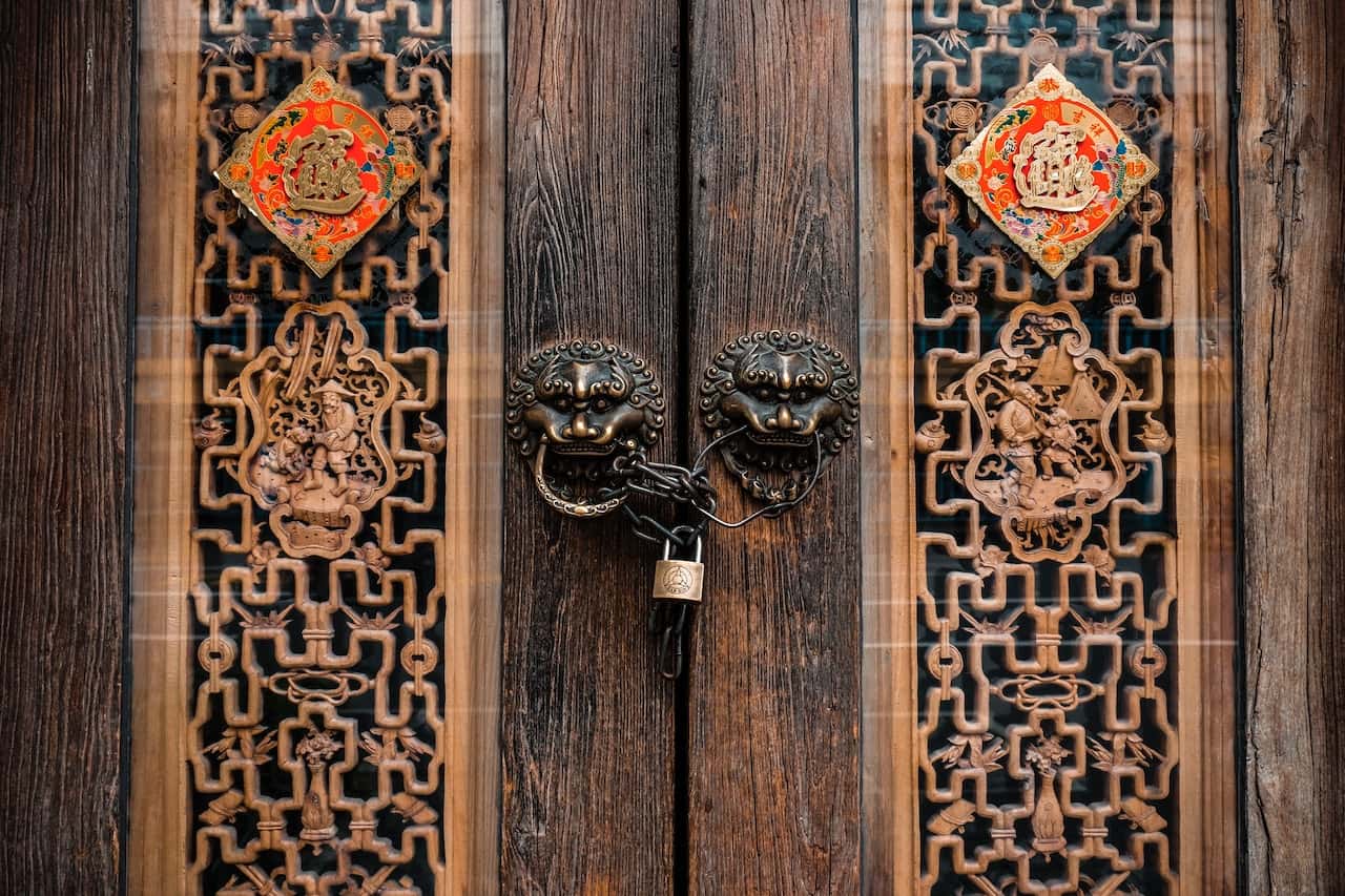 double door knocker chain and padlock