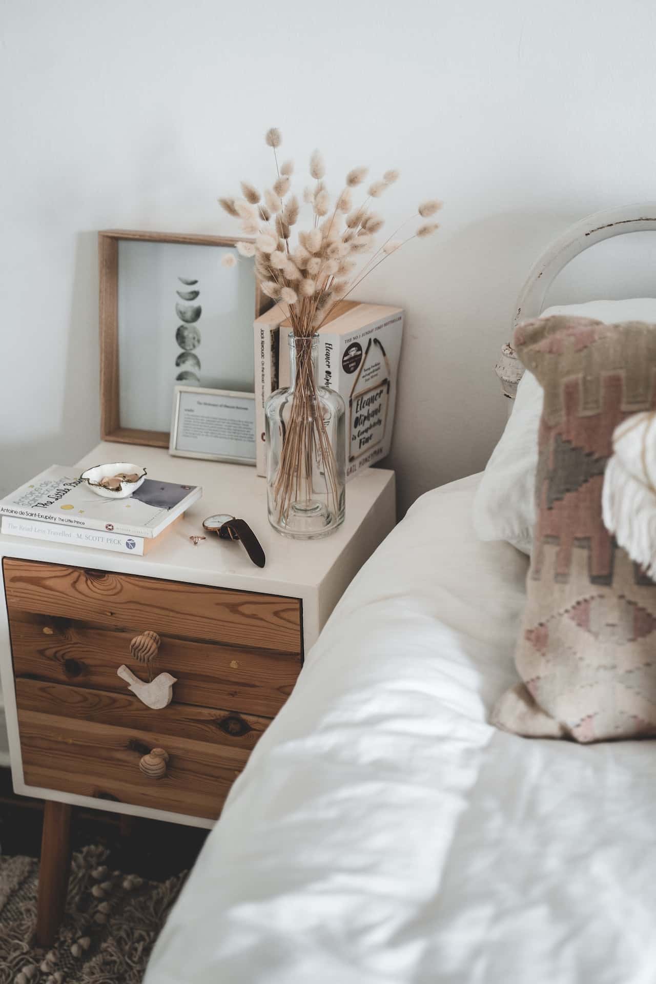 comfy bed and bedside table