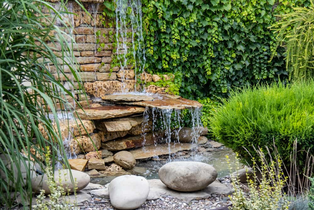 17 Outdoor Fountain Ideas - How To Make a Garden Fountain for Your Backyard