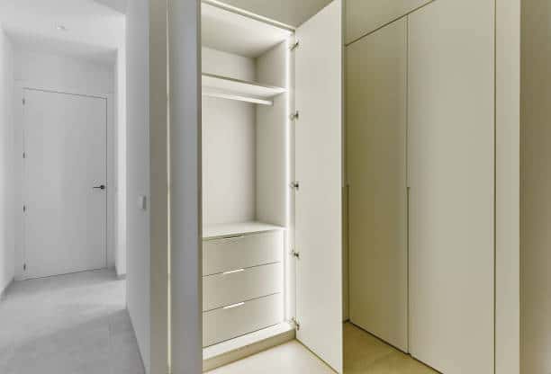 white closet with lighting