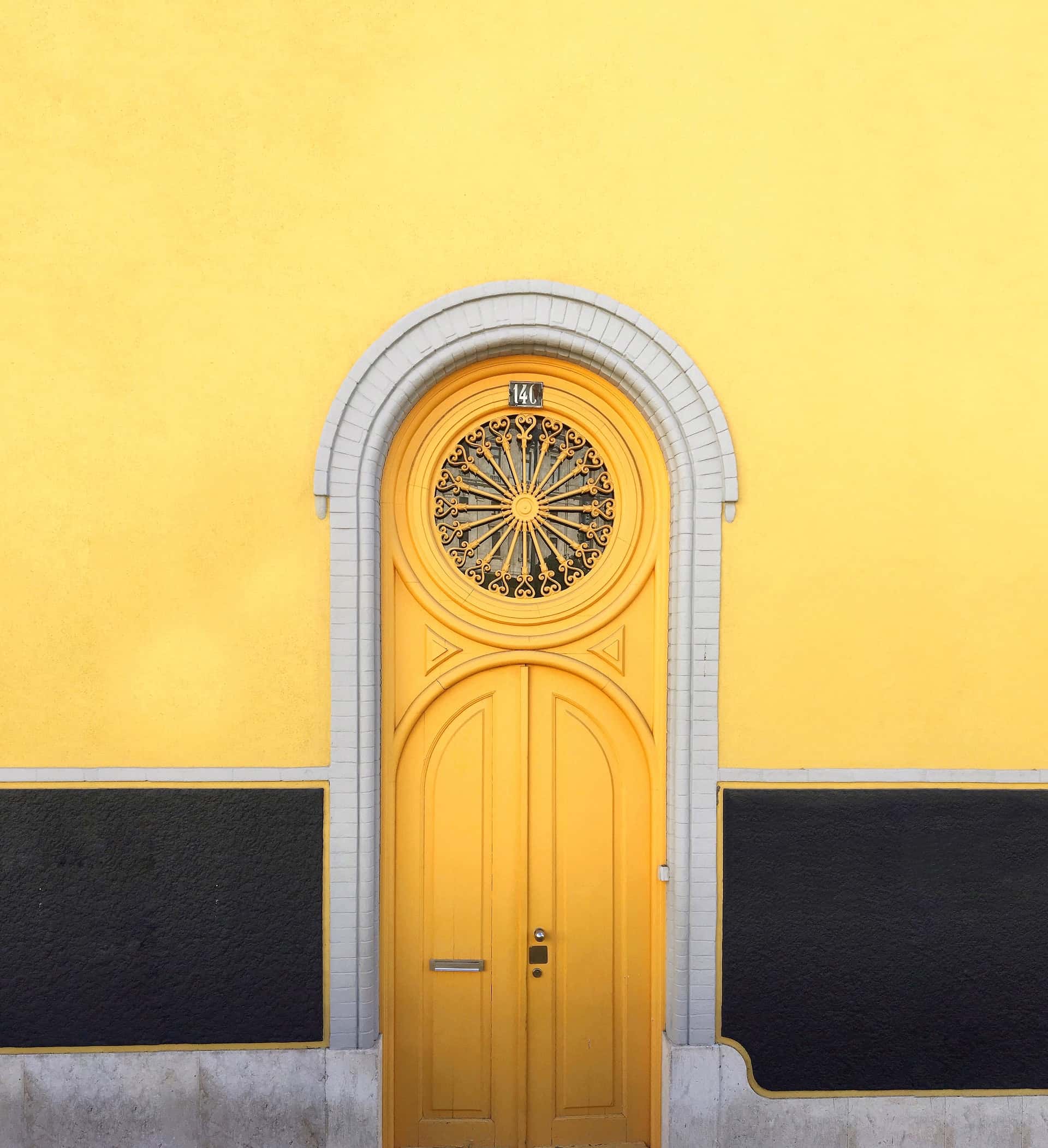 yellow iron gate double door design