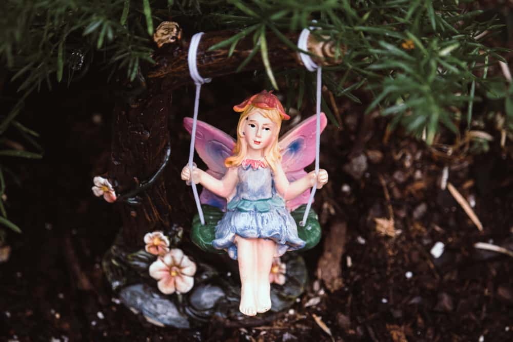 a fairy on the swing mini garden design