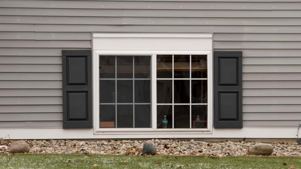 window grills design with 2-panel wood frame