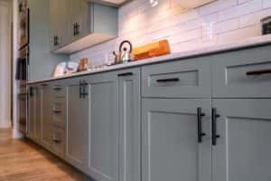 kitchen cabinets white countertop black handles