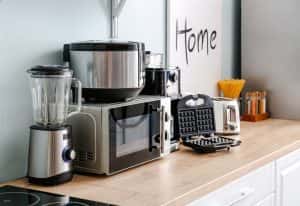Household Appliances On Table Kitchen