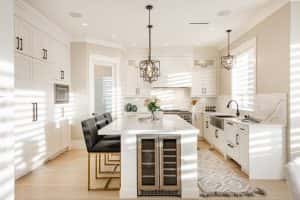 warm white kitchen expansive countertops island