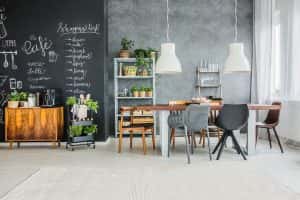 chalkboard accents mismatched chairs eclectic dining